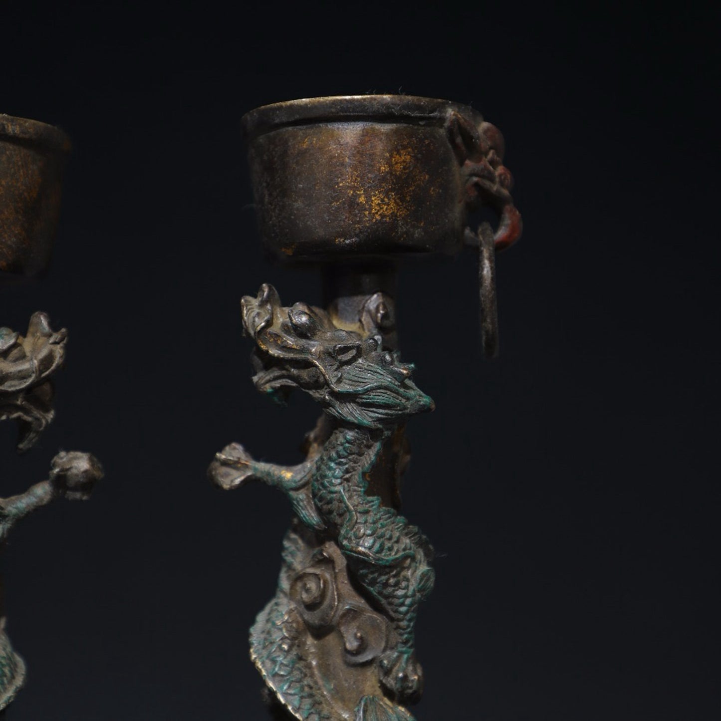 A pair of pure copper double dragon candle holders