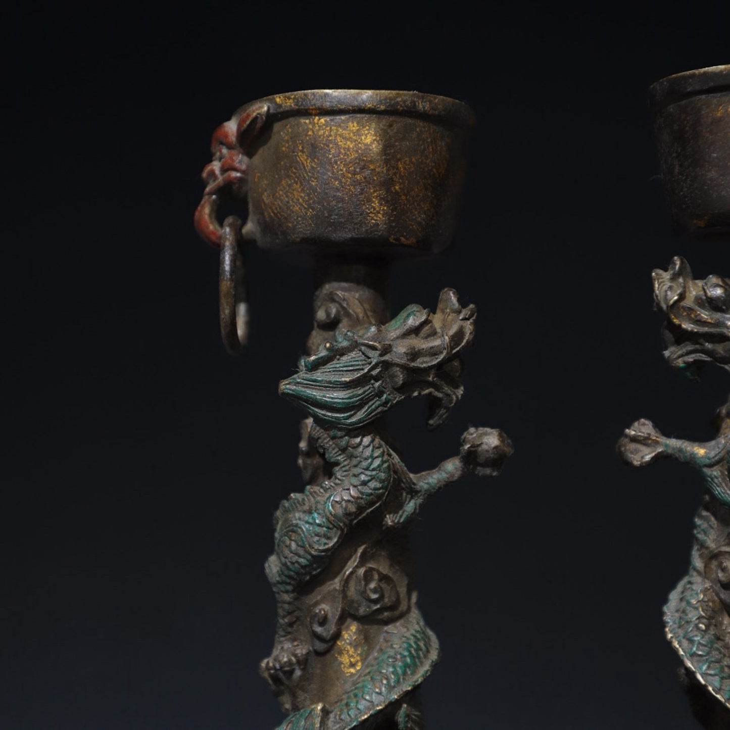 A pair of pure copper double dragon candle holders