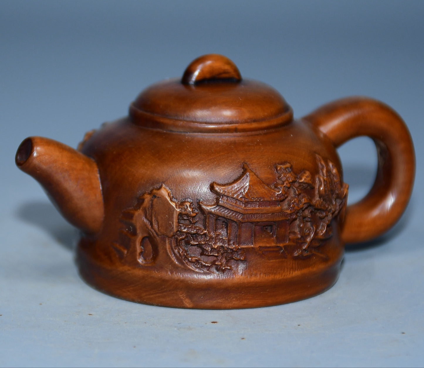 Collection of boxwood carved mountain water bottle handles