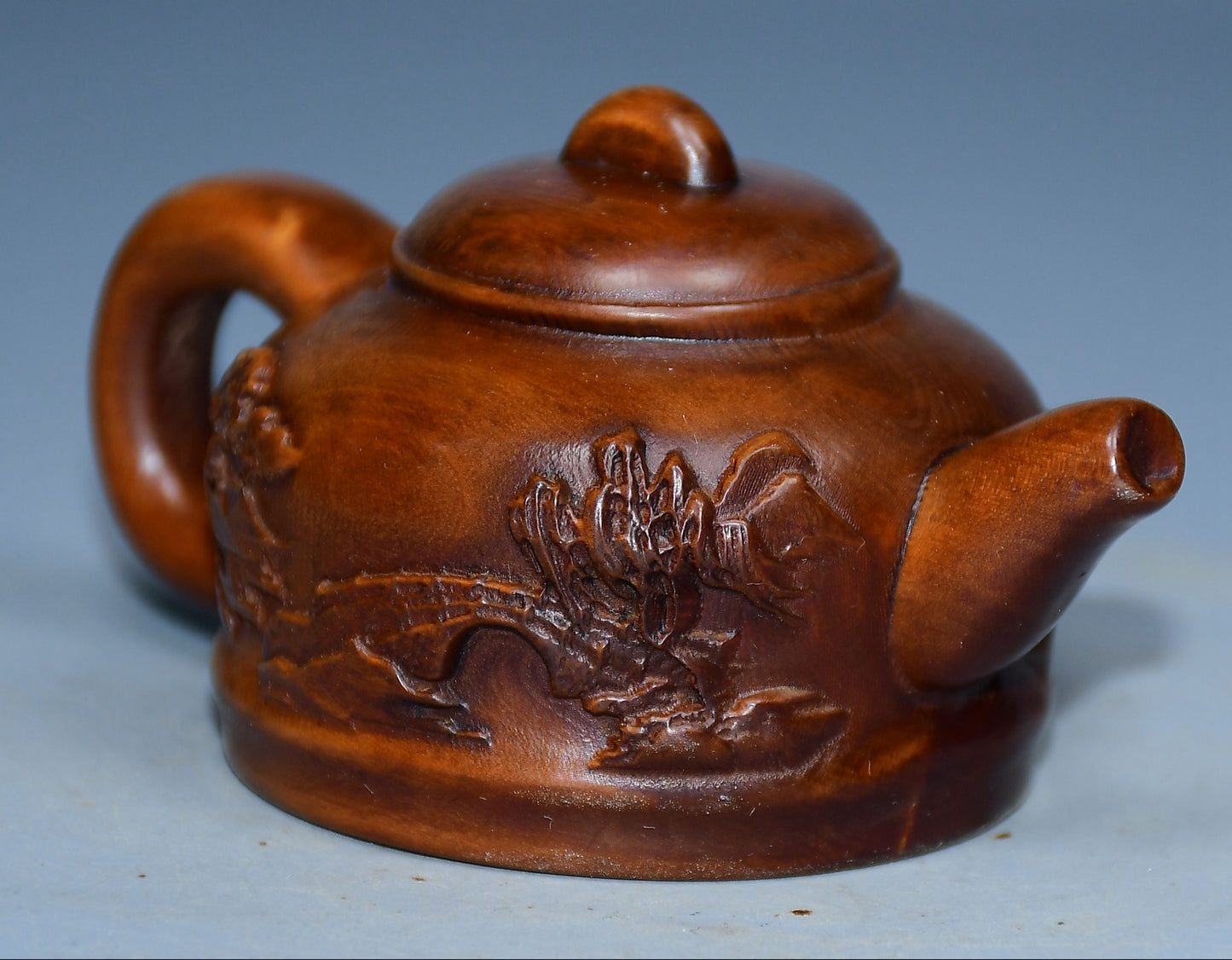 Collection of boxwood carved mountain water bottle handles