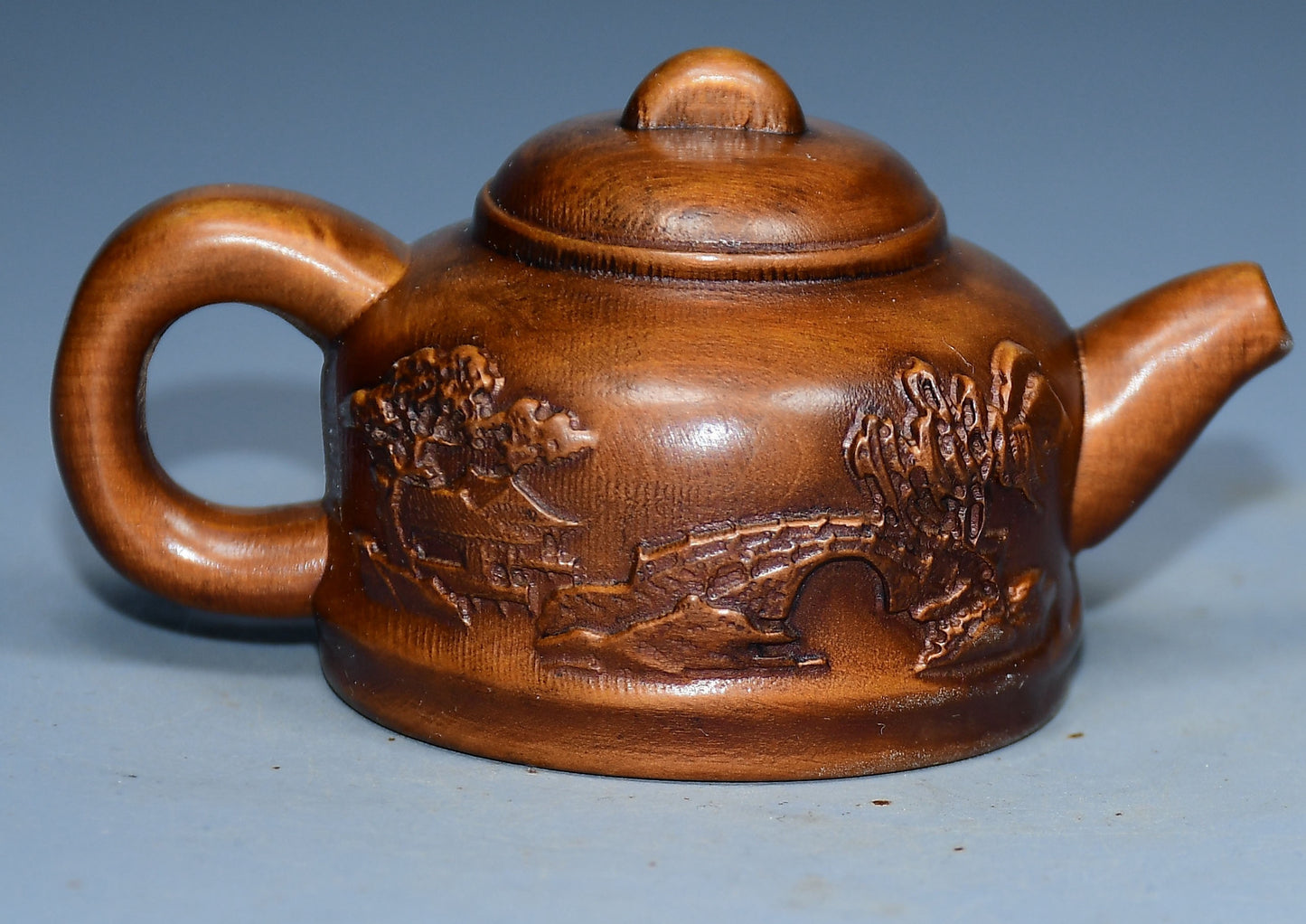 Collection of boxwood carved mountain water bottle handles