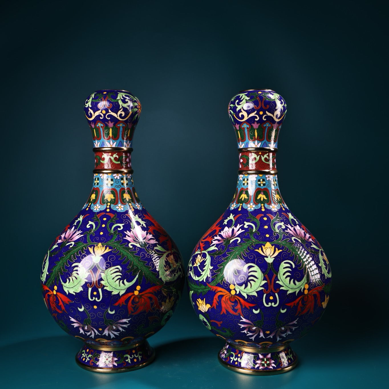 A pair of pure copper gilded cloisonn é enamel colored vases