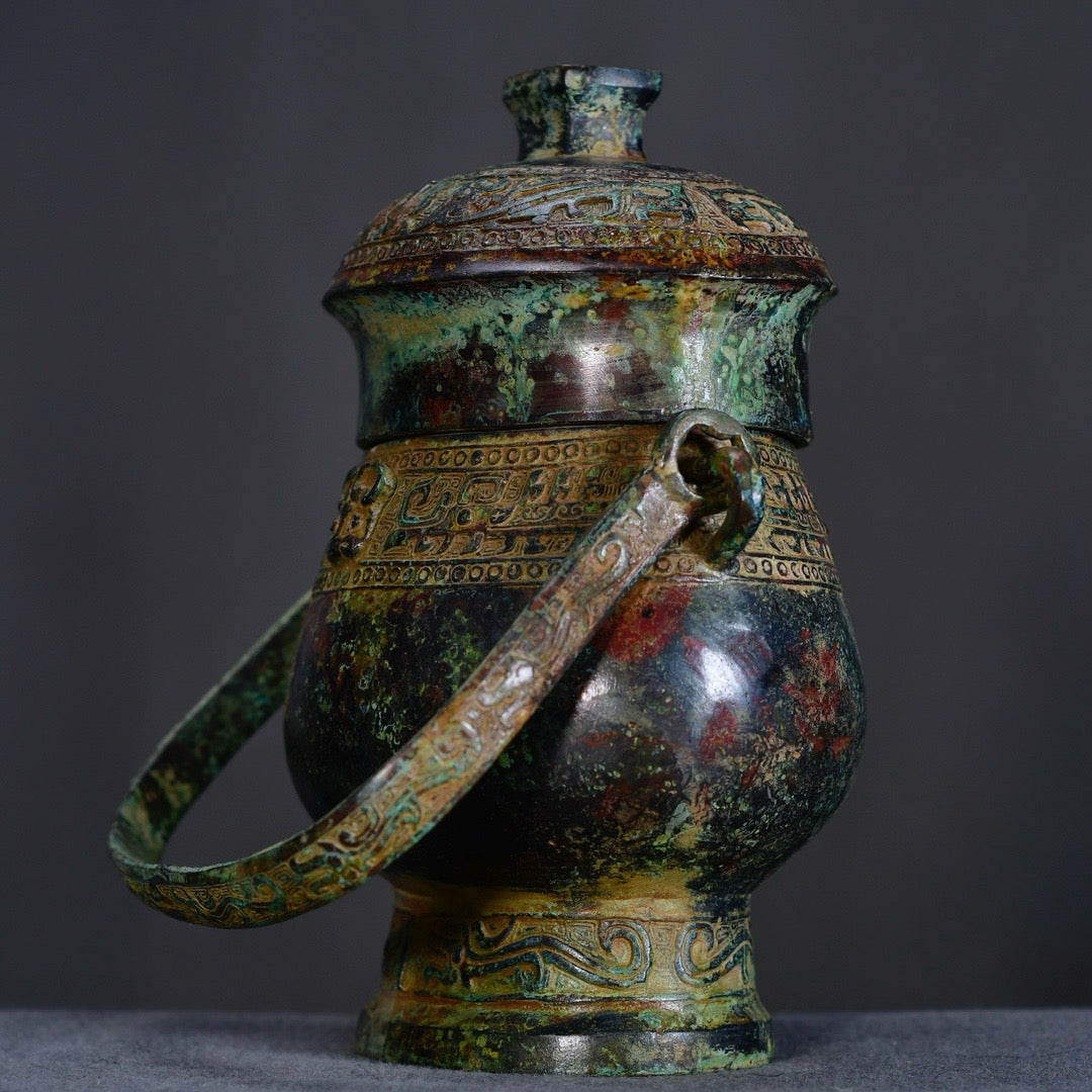 Chinese antique bronze lifting beam teapot