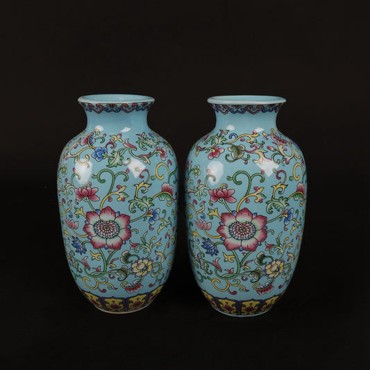 A pair of enamel colored small Donggua bottles