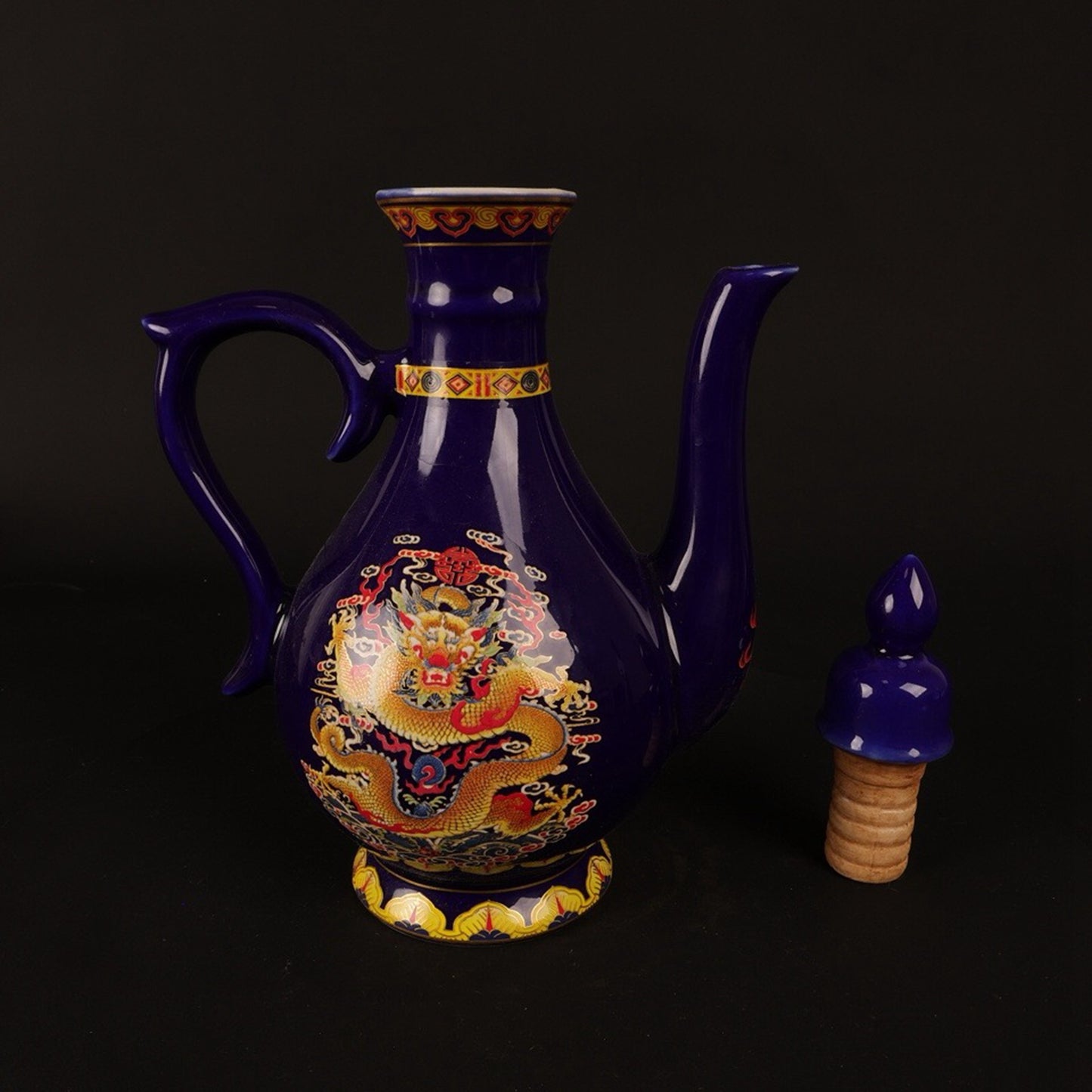 Blue glazed pink dragon patterned small wine pot