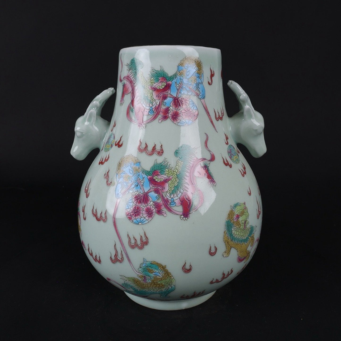 Blue glazed pink lion patterned sheep head statue