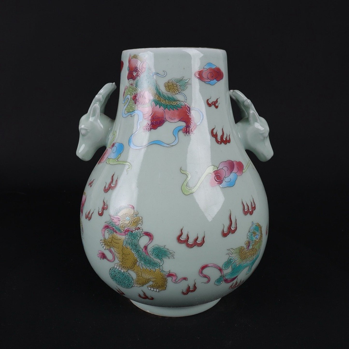 Blue glazed pink lion patterned sheep head statue