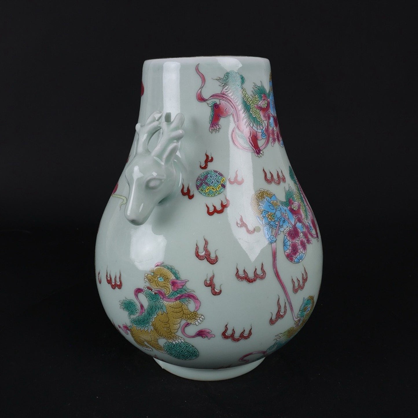 Blue glazed pink lion patterned sheep head statue