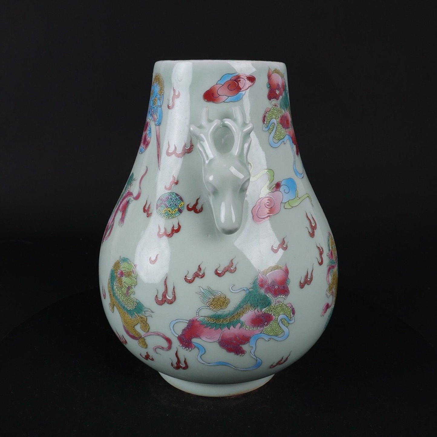 Blue glazed pink lion patterned sheep head statue