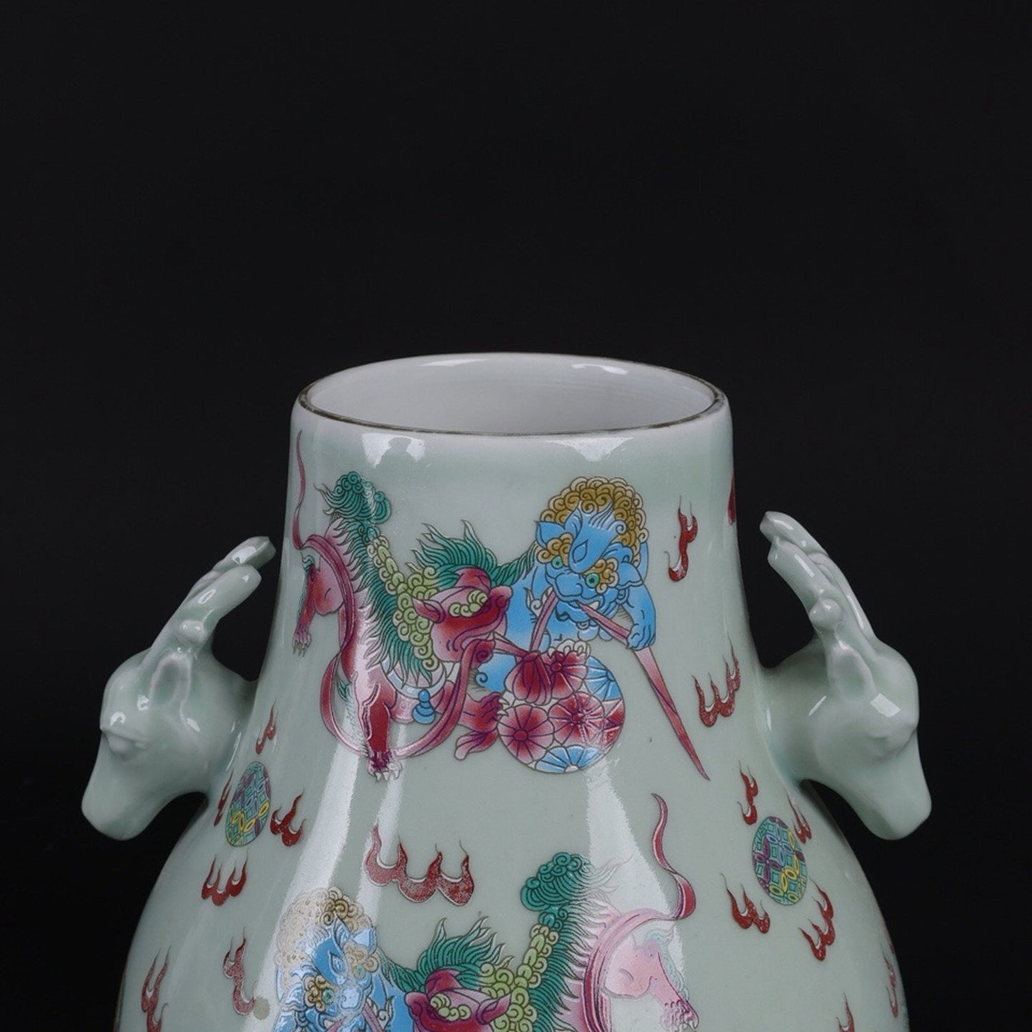 Blue glazed pink lion patterned sheep head statue