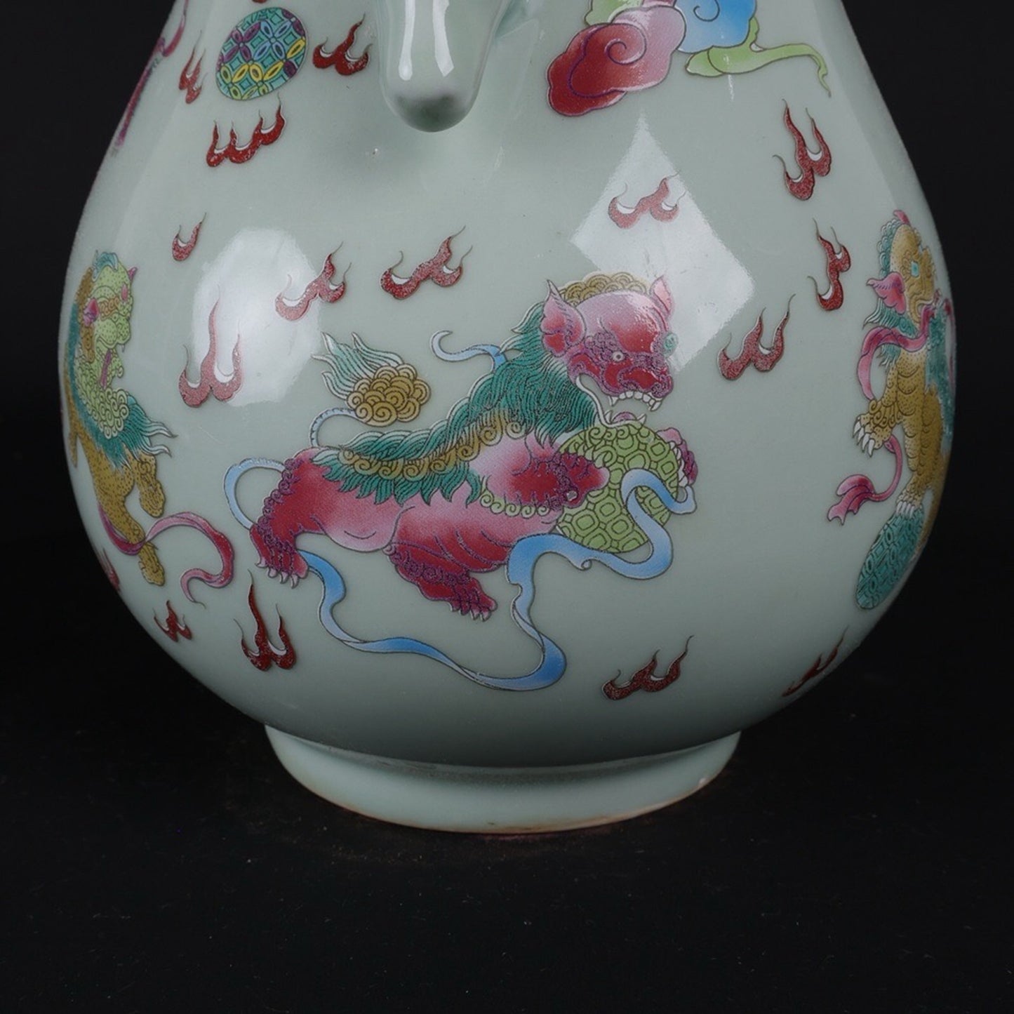 Blue glazed pink lion patterned sheep head statue