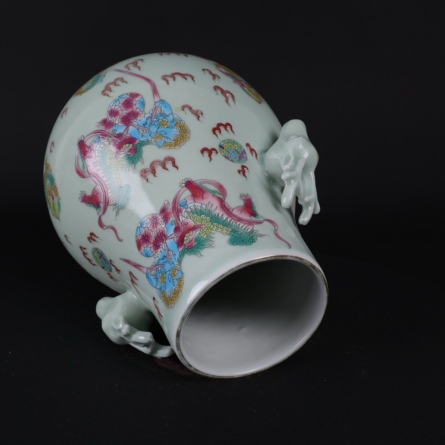 Blue glazed pink lion patterned sheep head statue