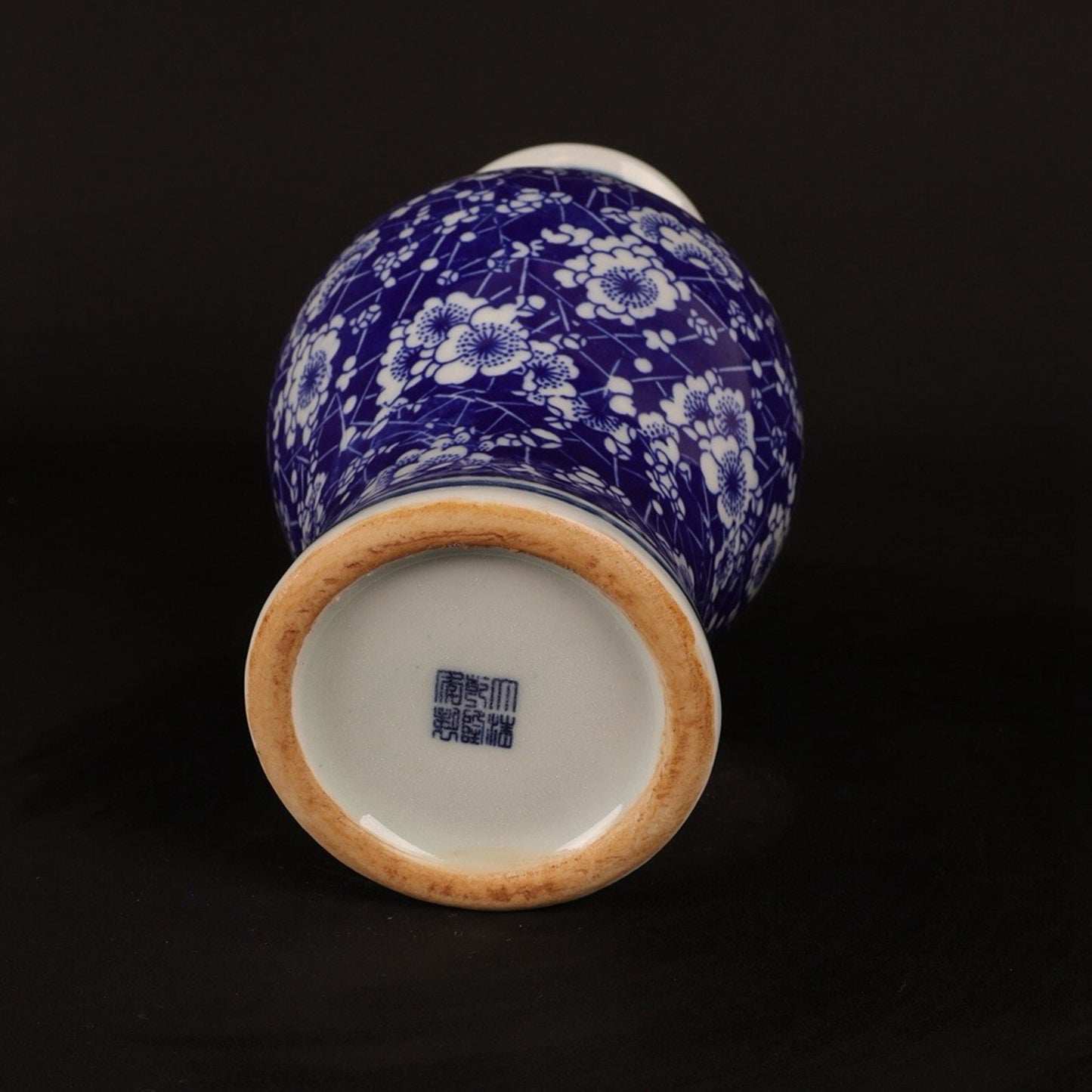 A pair of blue and white ice plum patterned fish tail bottles