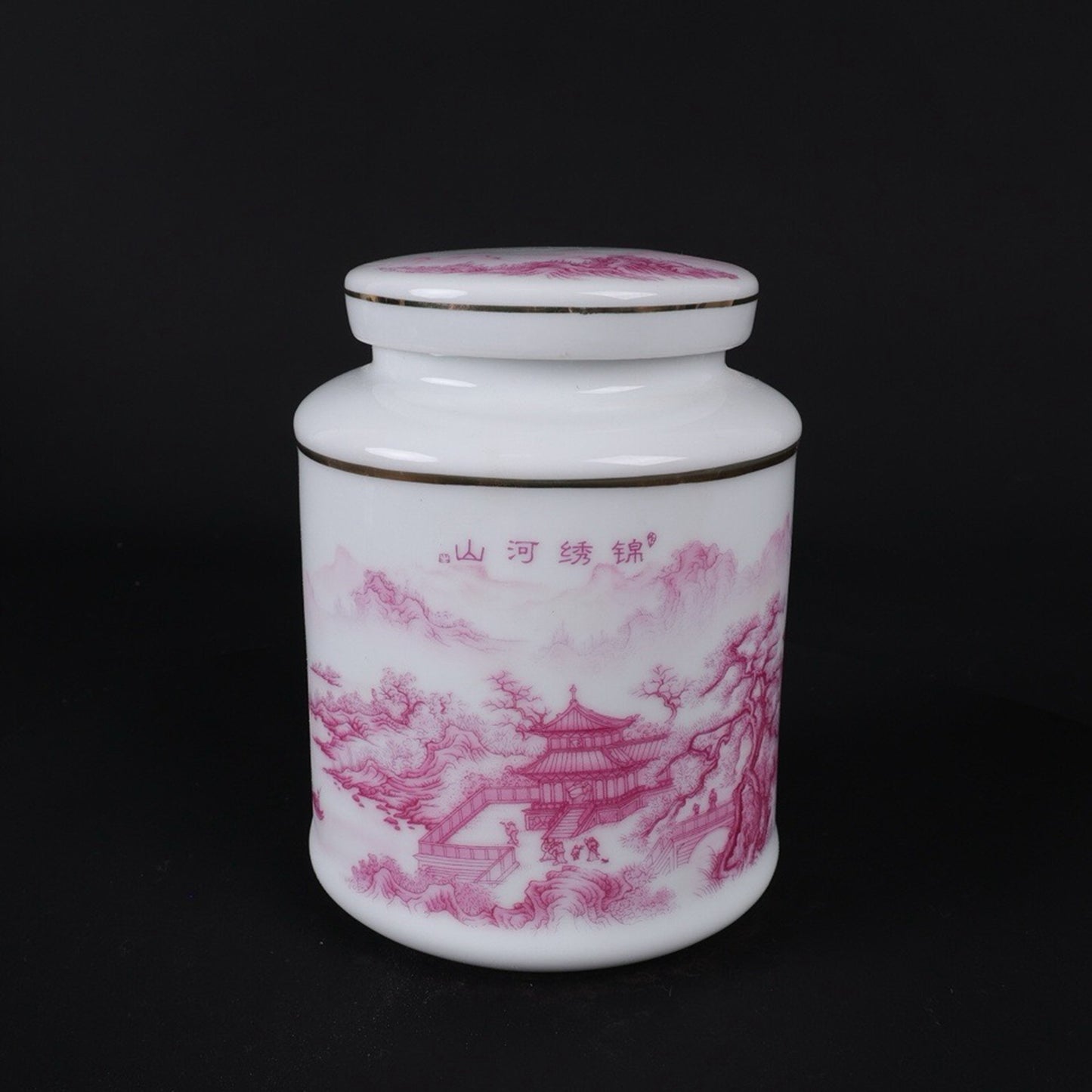 Pink and colorful tea jar with picturesque river and mountain patterns