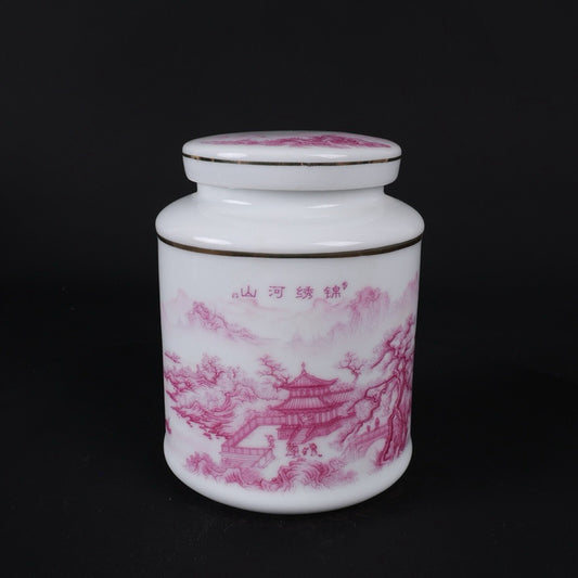 Pink and colorful tea jar with picturesque river and mountain patterns