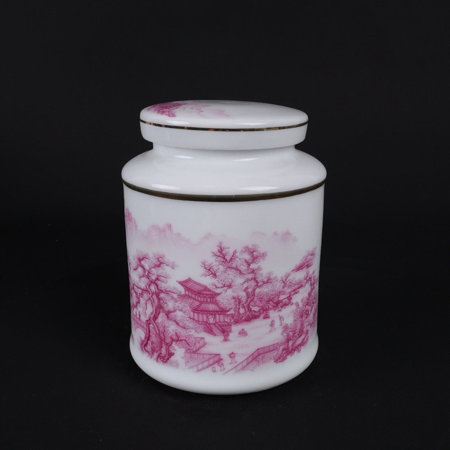 Pink and colorful tea jar with picturesque river and mountain patterns