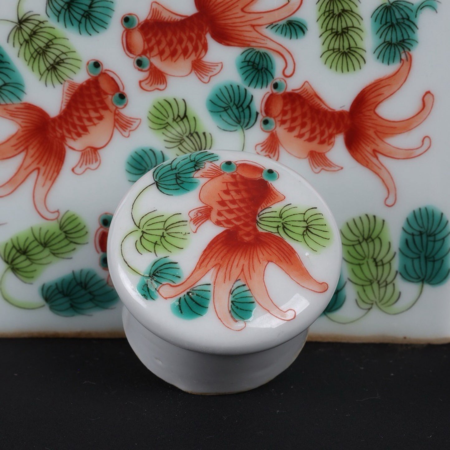 Pink goldfish patterned tea jar