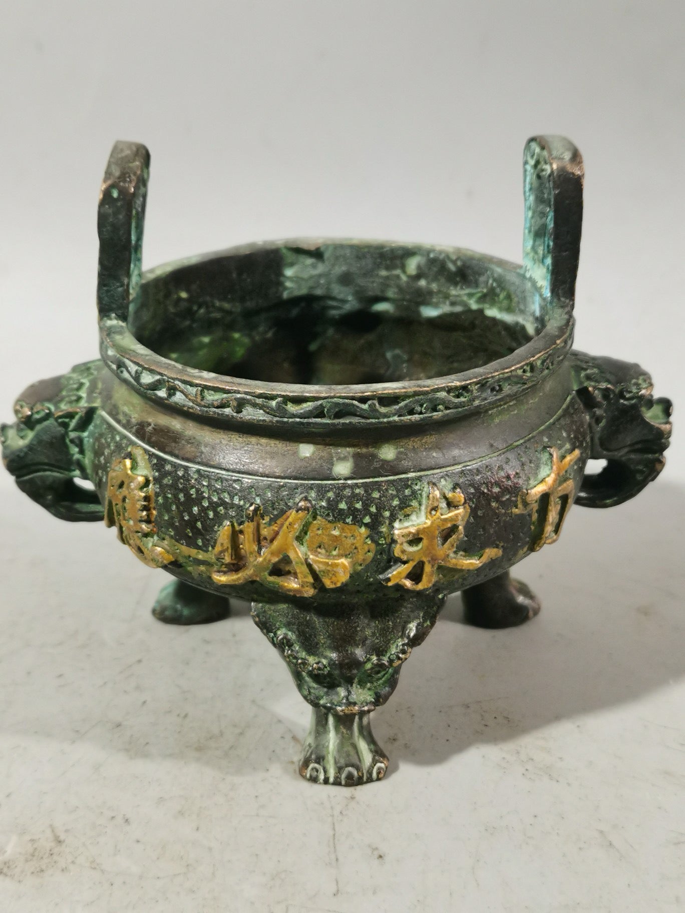 Chinese antique pure copper gilded gold three legged double ear incense burner ornament