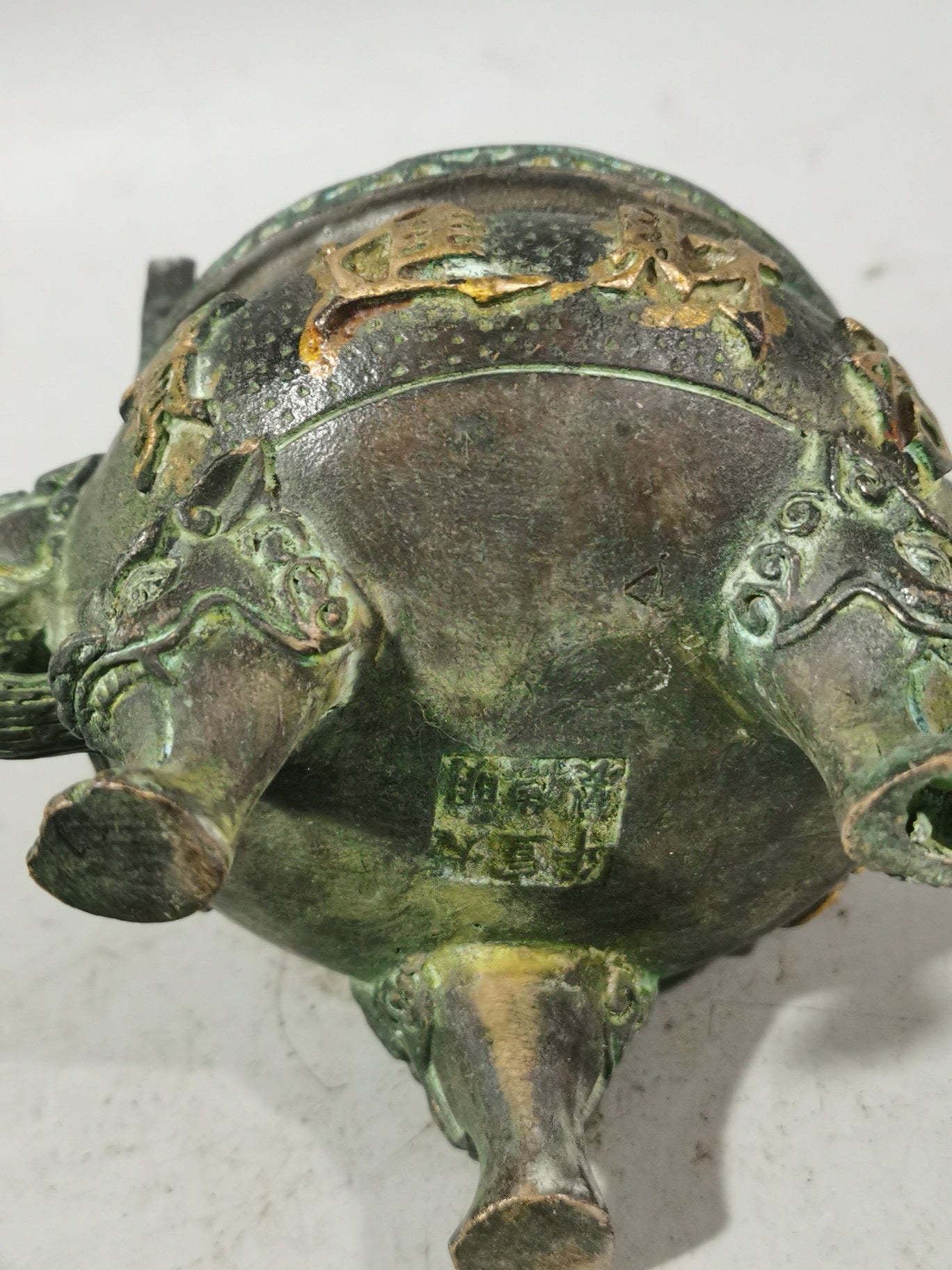 Chinese antique pure copper gilded gold three legged double ear incense burner ornament