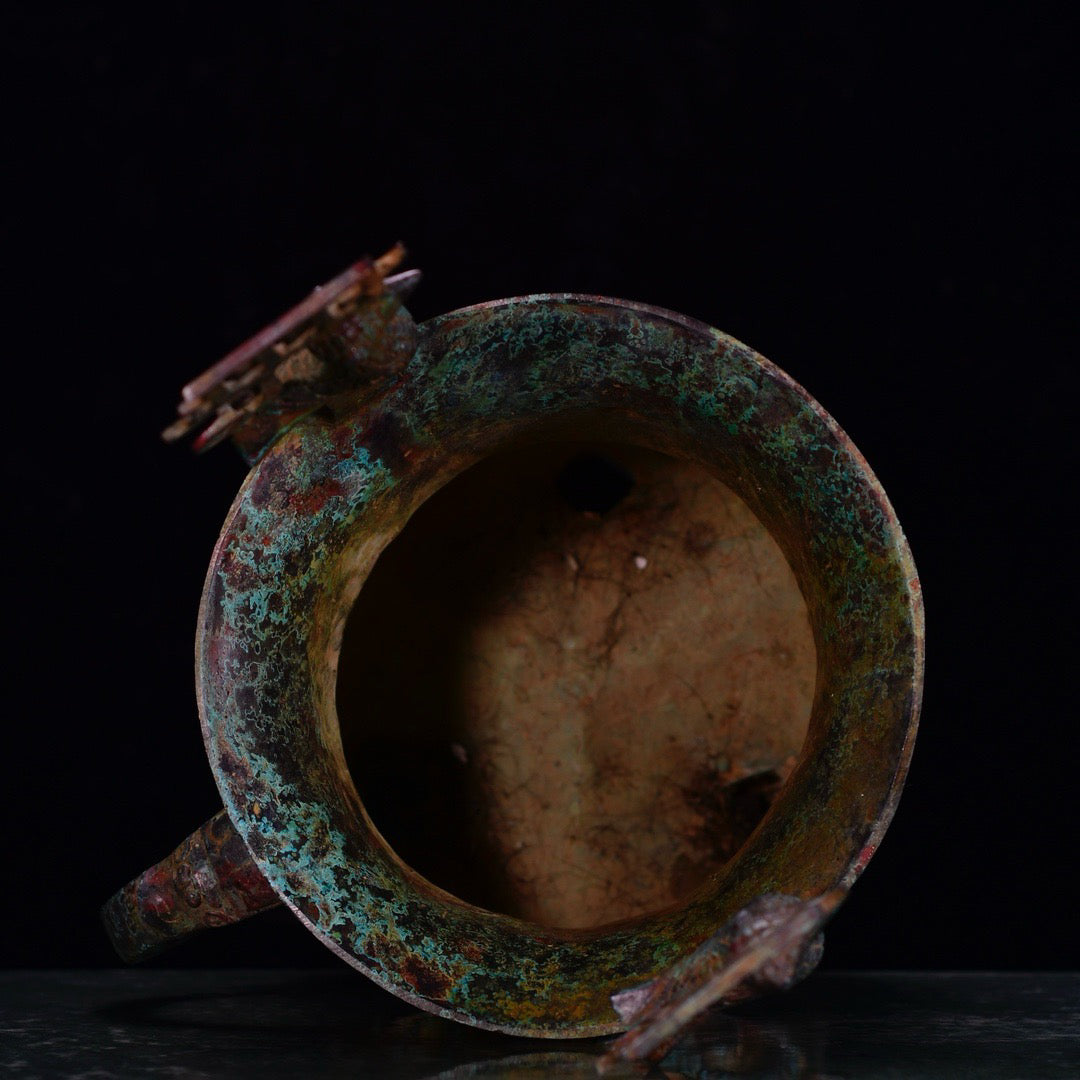 Chinese antique bronze phoenix patterned beast faced three legged bronze vessel