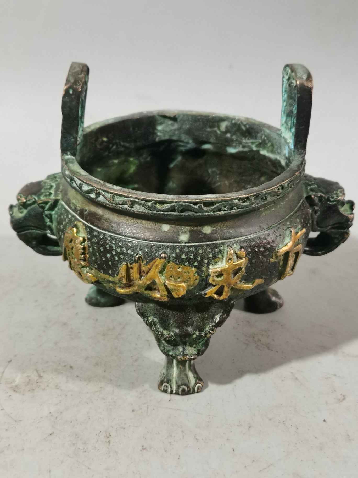 Chinese antique pure copper gilded gold three legged double ear incense burner ornament