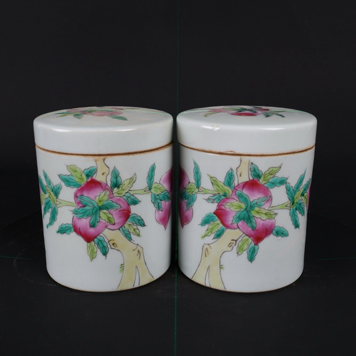 A pair of Republic of China pink nine peach patterned tea jars
