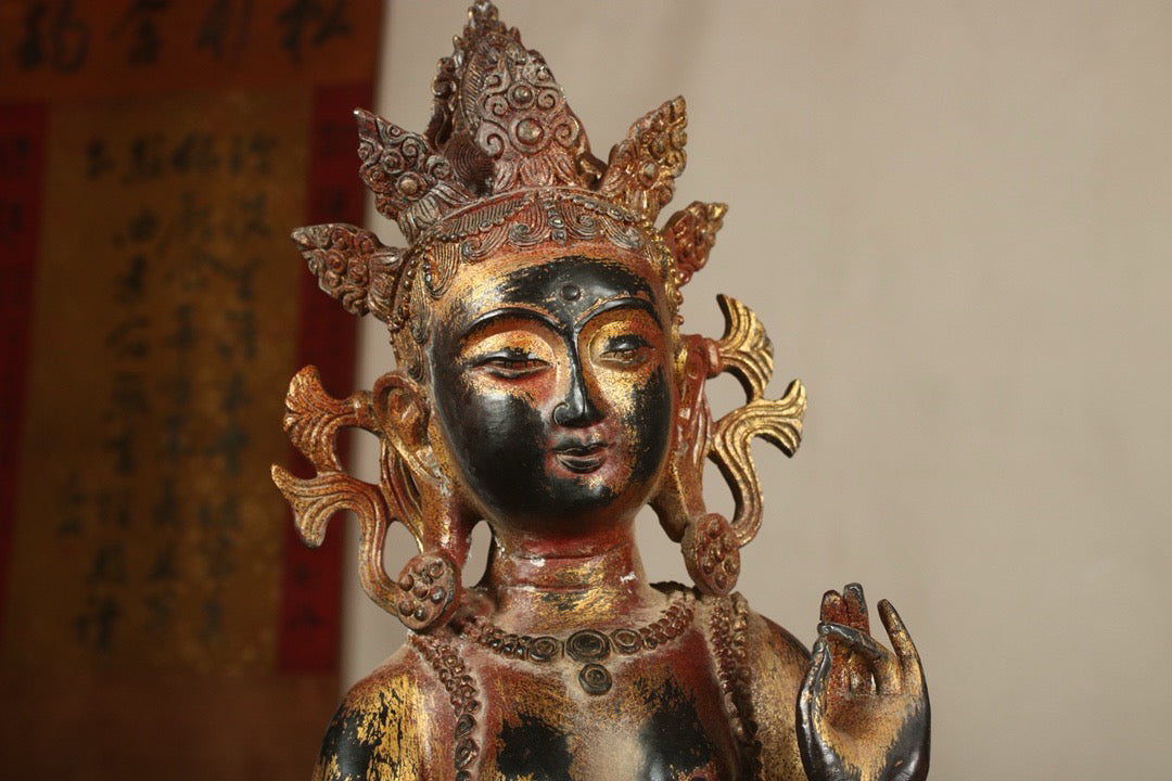 A Chinese antique bronze gilded handmade green tara statue