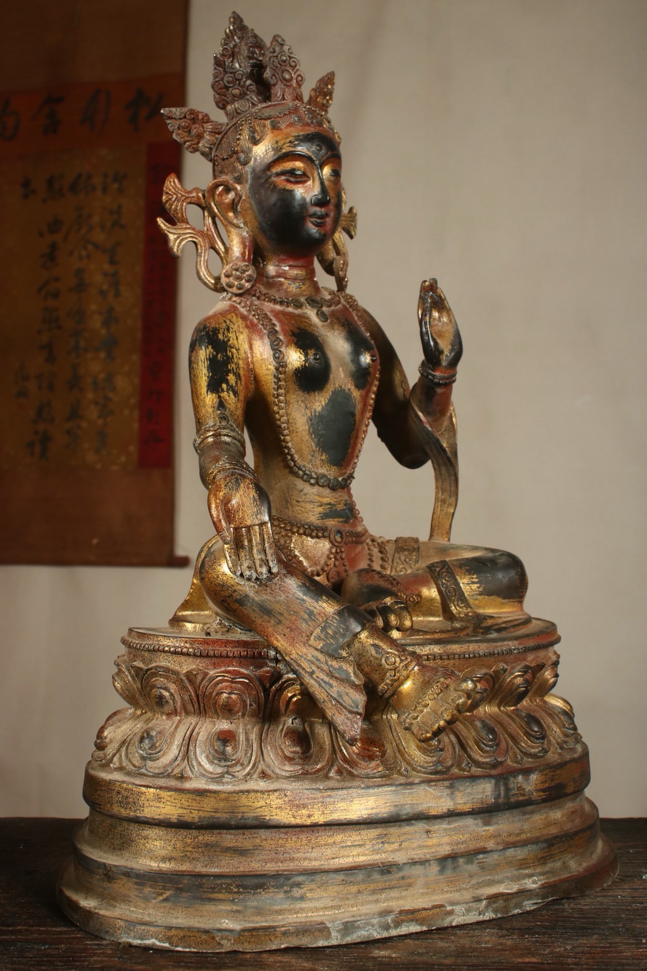 A Chinese antique bronze gilded handmade green tara statue