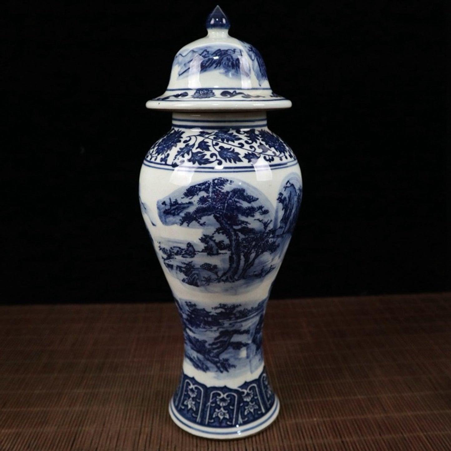 Blue and white landscape pattern general jar
