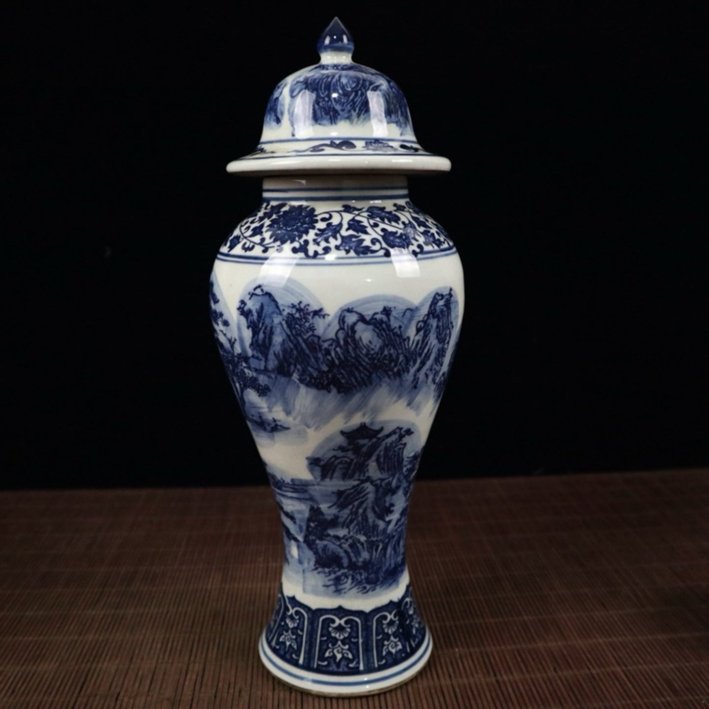 Blue and white landscape pattern general jar