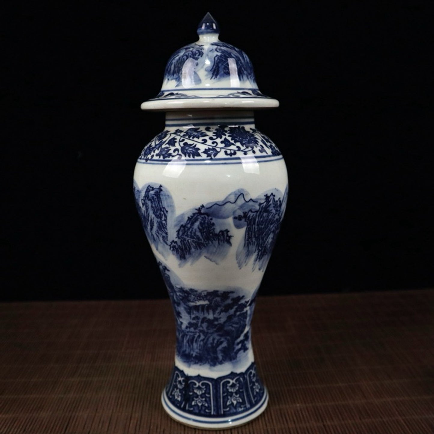 Blue and white landscape pattern general jar