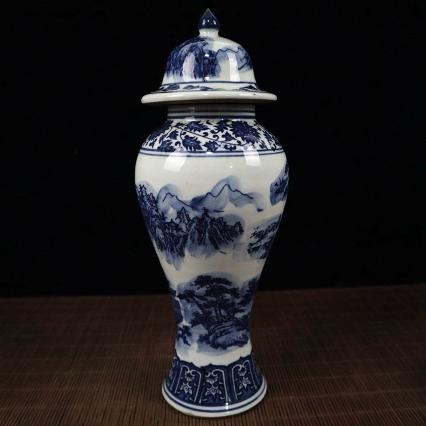 Blue and white landscape pattern general jar