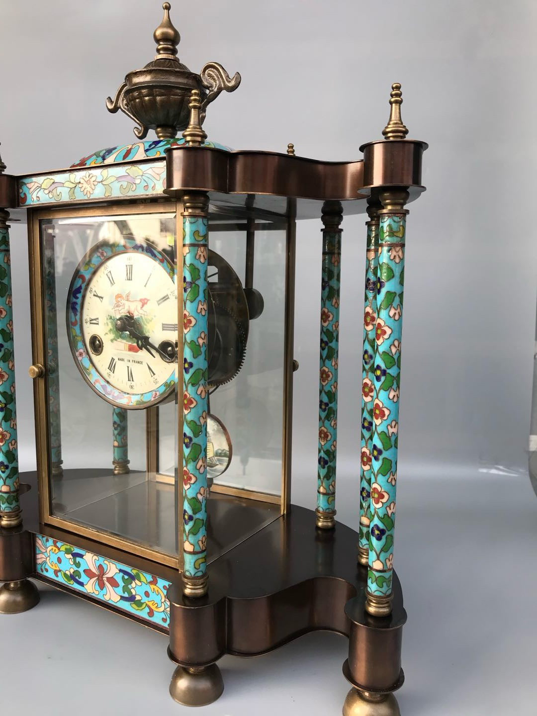 Enamel colored mechanical ancient clock