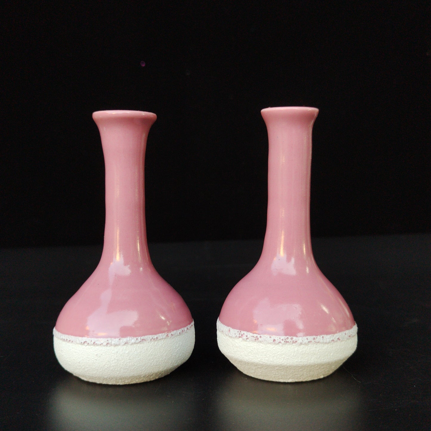 A pair of ceramic vases for home decoration,