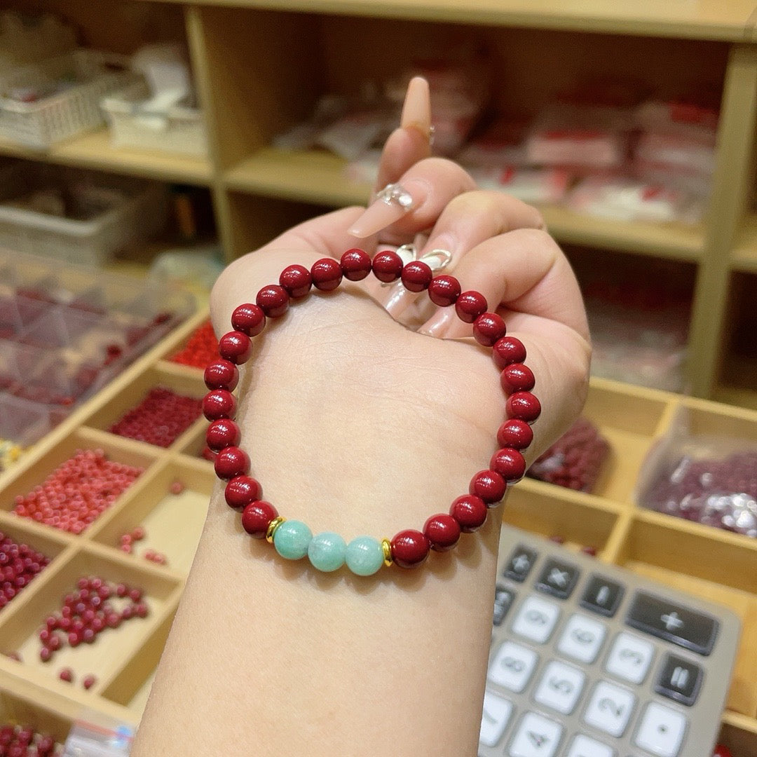 Vermilion and purple clay bracelets