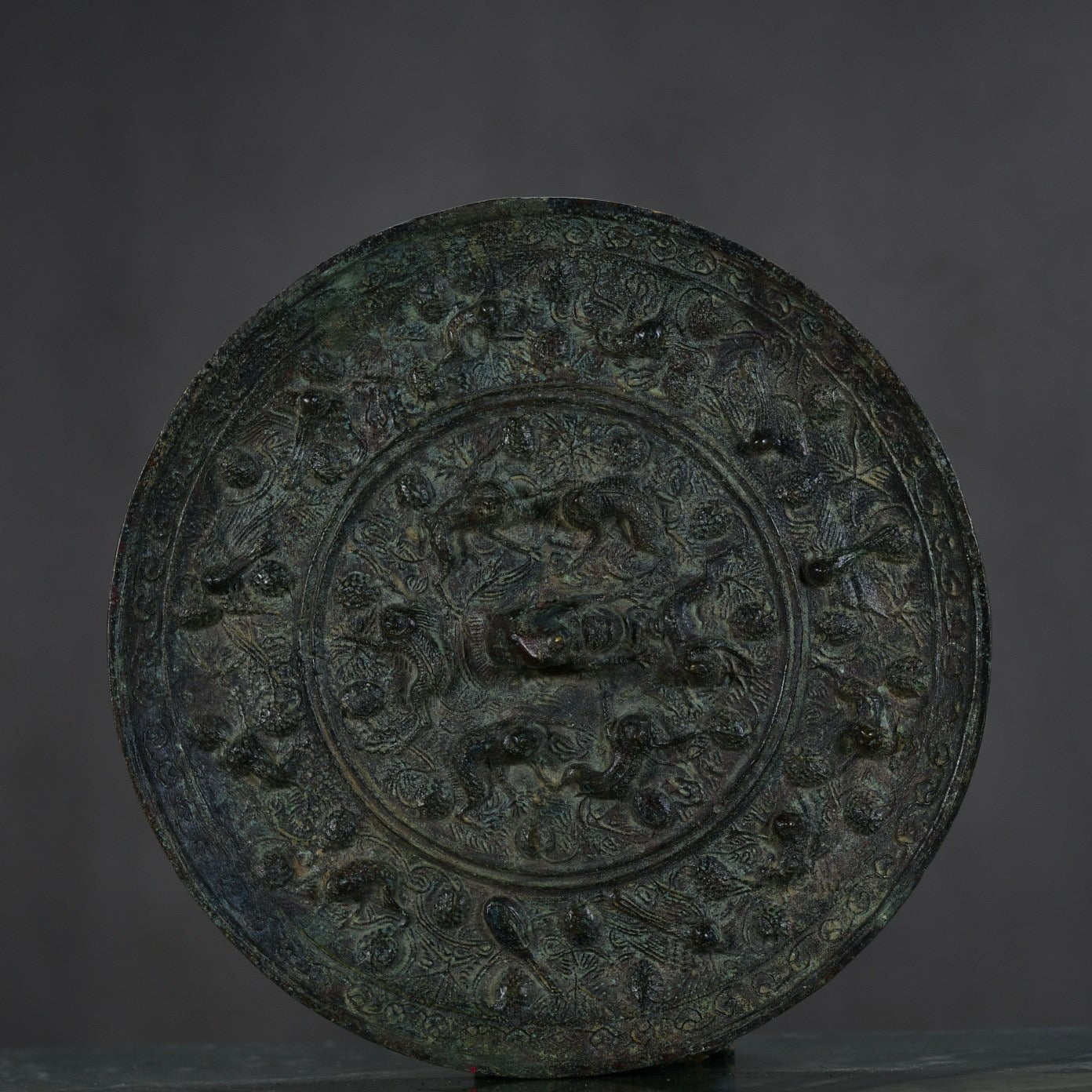 Chinese antique bronze sea animal grape mirror