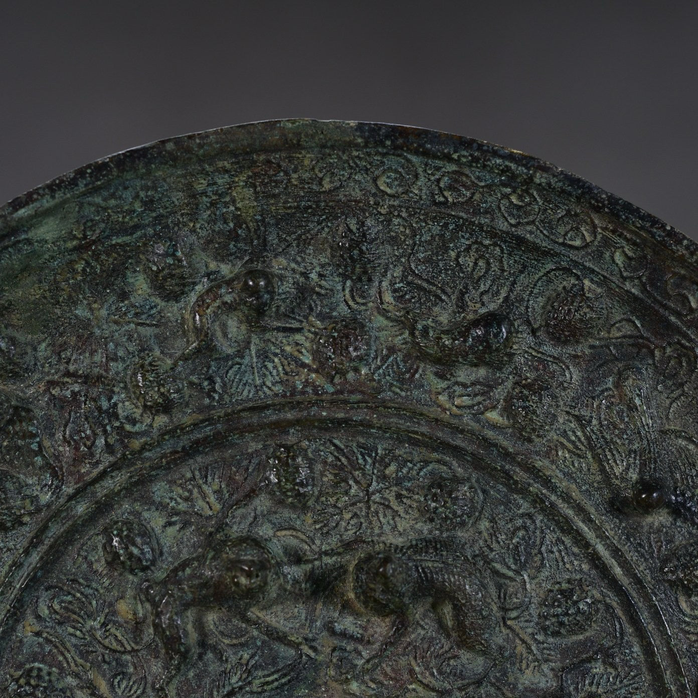 Chinese antique bronze sea animal grape mirror