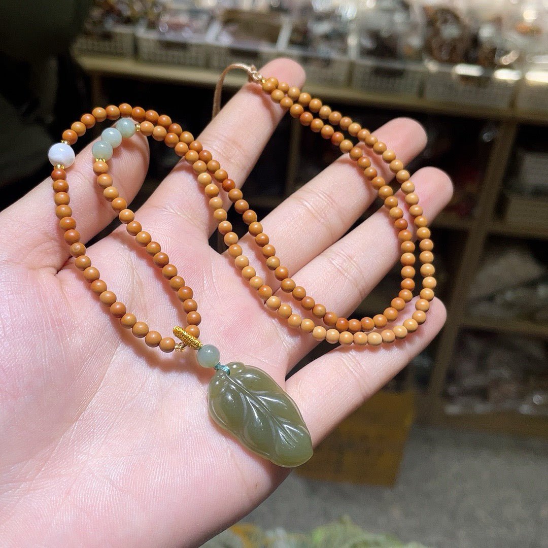 Olive Stone and Hotan Yuqing Water Leaf Necklace
