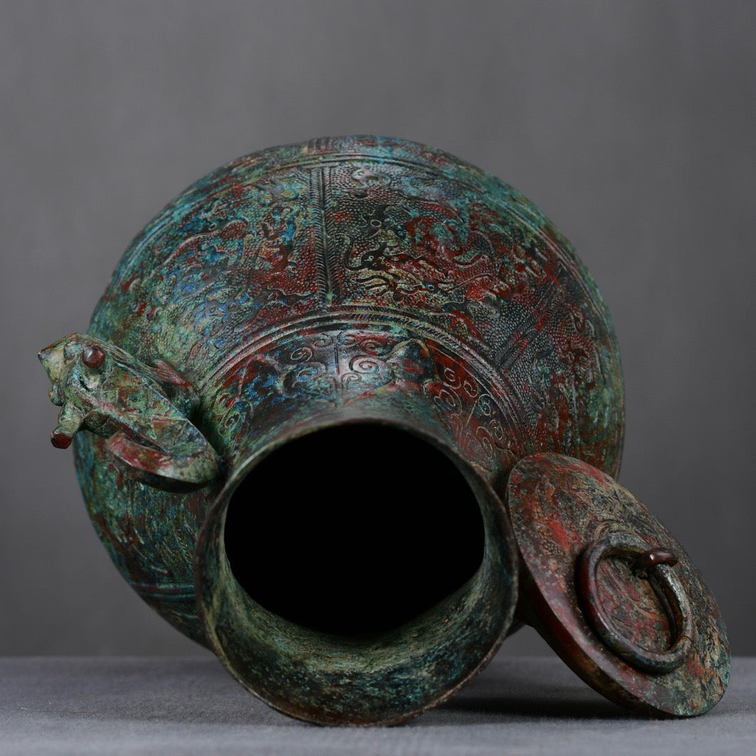 Chinese antique bronze hunting patterned teapot