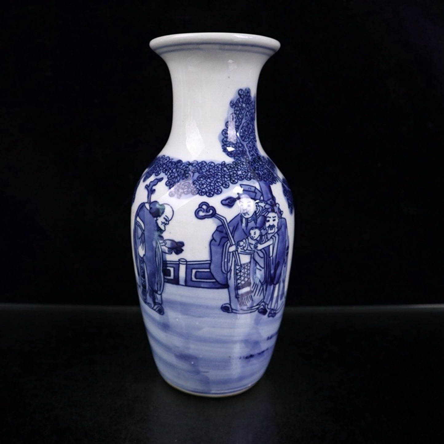 Blue and white three star figure patterned vase