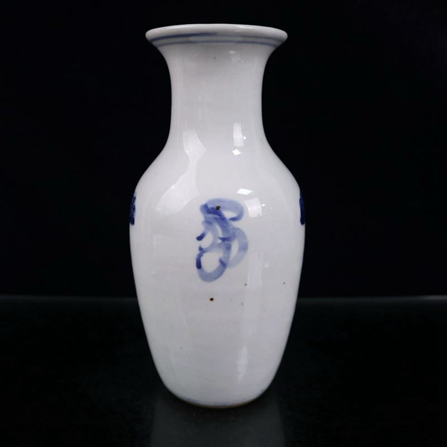 Blue and white three star figure patterned vase