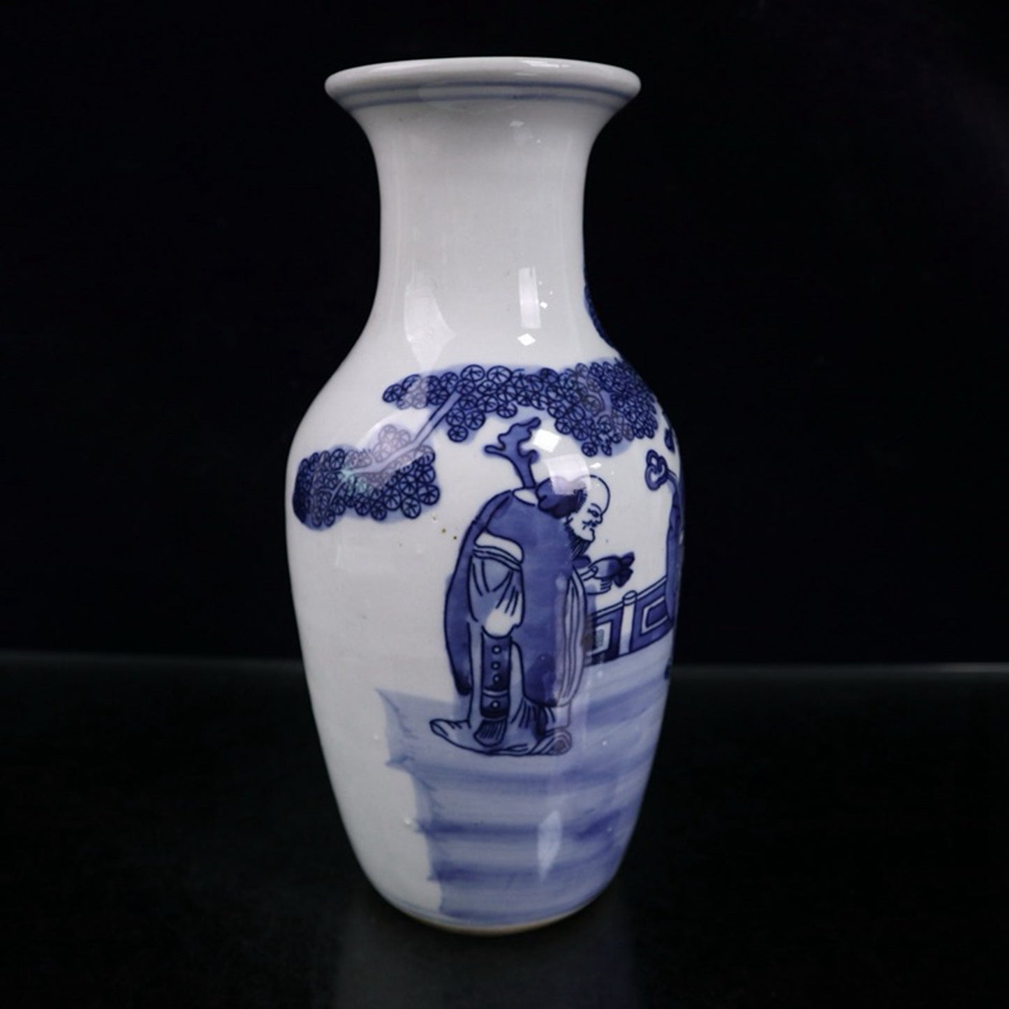 Blue and white three star figure patterned vase