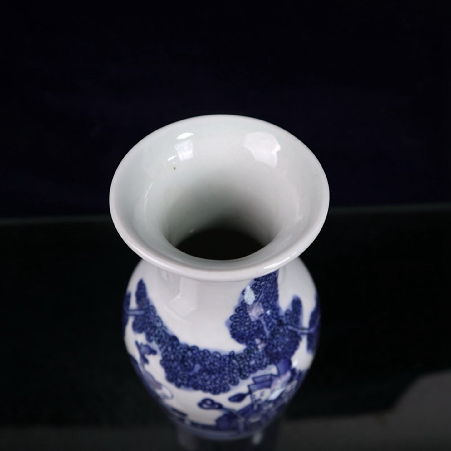 Blue and white three star figure patterned vase