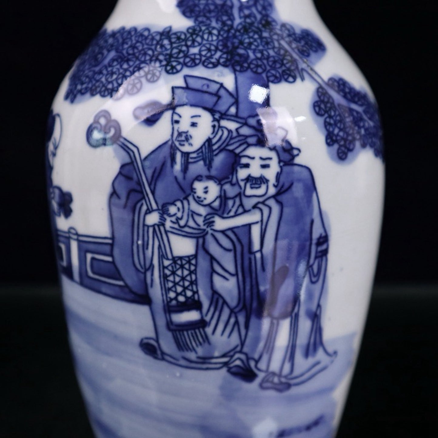 Blue and white three star figure patterned vase