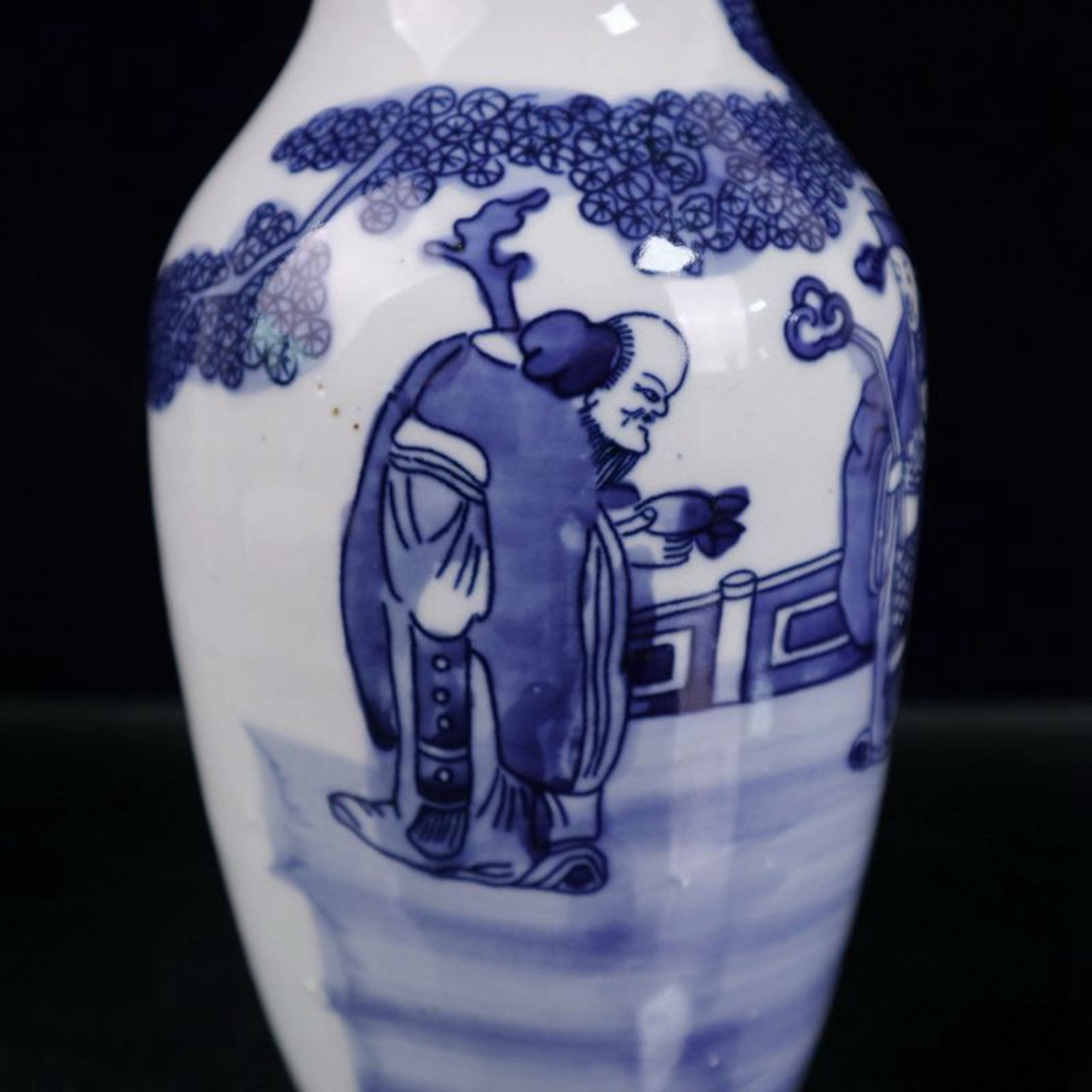 Blue and white three star figure patterned vase