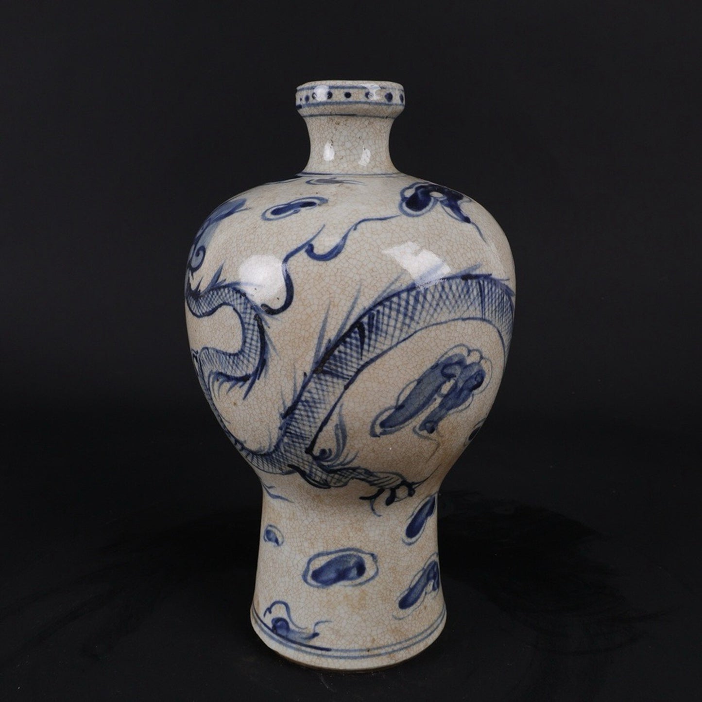 Open blue and white dragon patterned plum vase