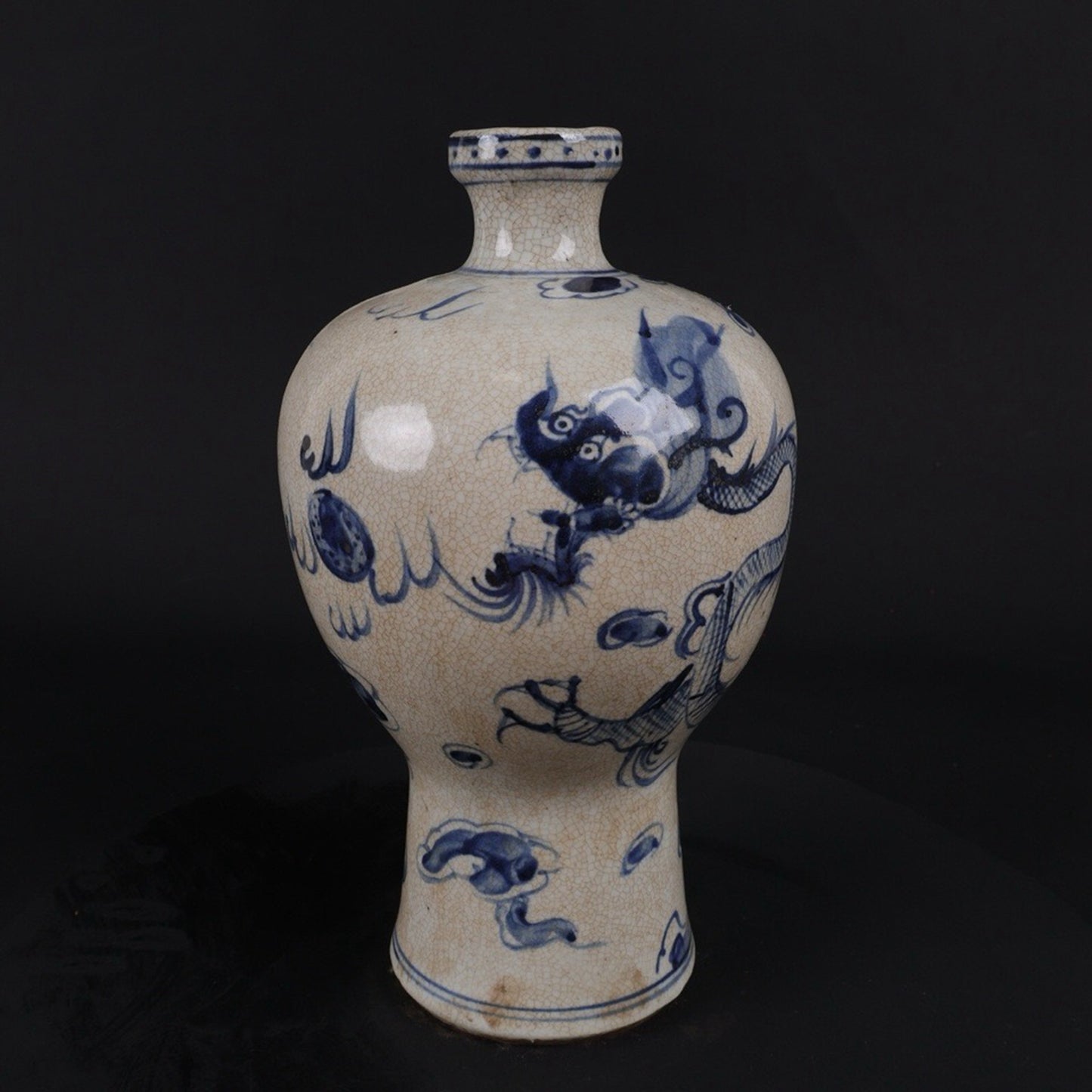 Open blue and white dragon patterned plum vase