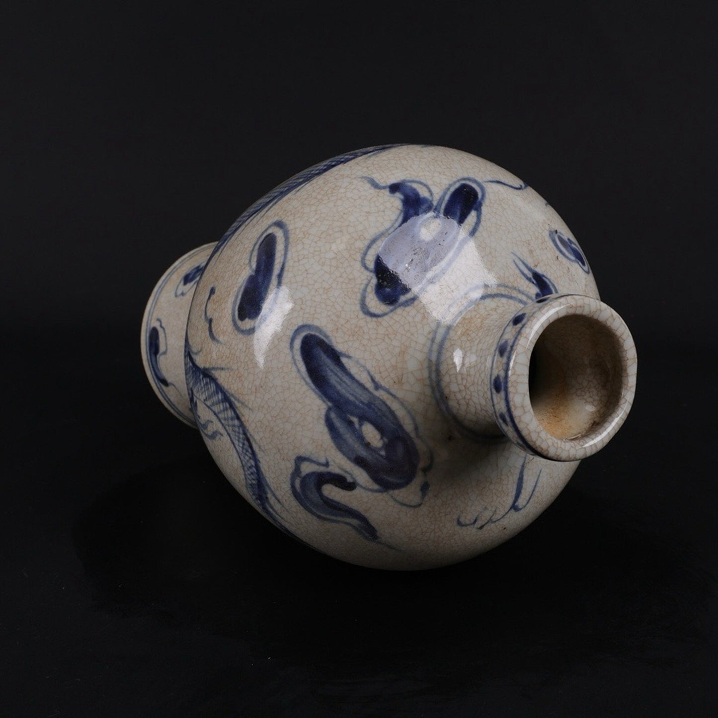 Open blue and white dragon patterned plum vase