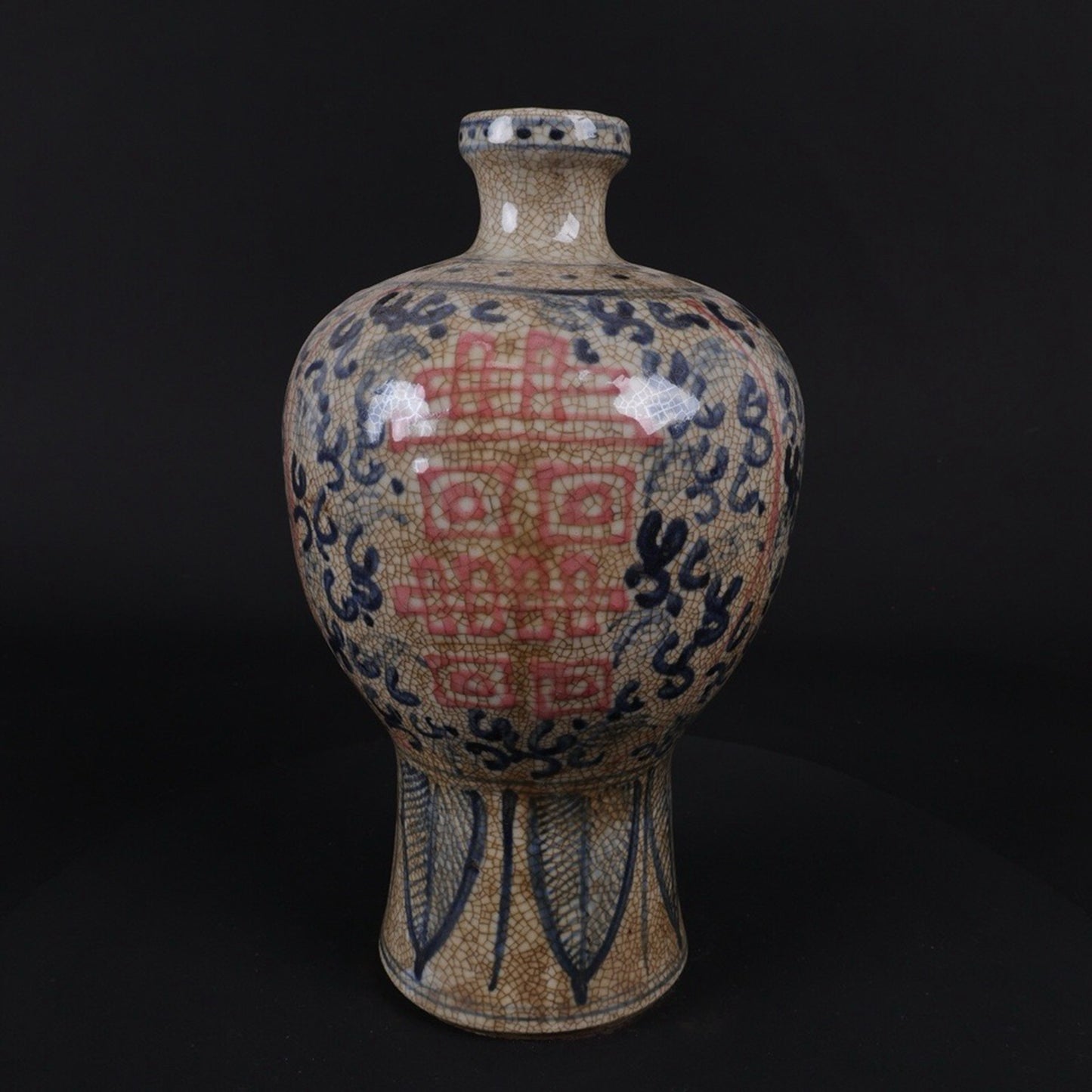 Blue and white glazed plum vase with red auspicious character pattern