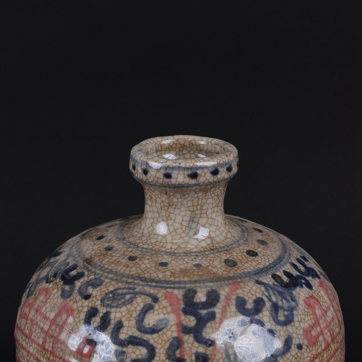 Blue and white glazed plum vase with red auspicious character pattern